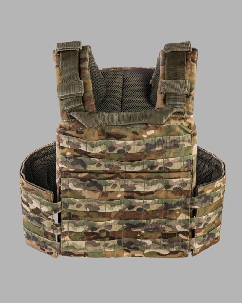 Detailed view of modern camouflage military tactical vest with MOLLE system.