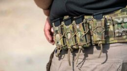 camo battle belt showcasing carrying capabilities.